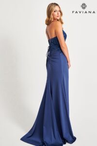 qués! The straps of the dress criss cross in the back and create a unique lace up look along with the ruching around the zipper closure. This dress is also perfect for special occasions and fancy formals, and is certain to make a statement with its glitzy details.
