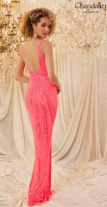This beautiful dress features a v-neck front and leggy slit with exquisite detailing of sparkling sequins that will add so much color and beauty to your event. The low scooped back makes this an elegant dress for the stylish gal in mind.