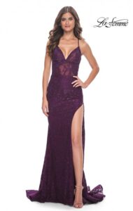 Gorgeous lace covers this dark berry prom dress which has then been embellished with rhinestones makes for a stunning combination for this dress. A low V-neckline, spaghetti straps, high side slit and sheer illusion bodice make this a must have for your prom. The striking open V back with zipper closure complements the lace up tie back.