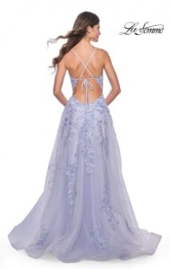 This lovely A-line lavender prom dress features beautiful and unique sequin lace applique. The V-neckline and illusion bodice with boning, high slit, and spaghetti straps which lead to the back of the dress to lace up the ties, altogether make this a dress a showstopper for your prom.  The back zipper closure complete the design of this chic and decorative dress.