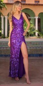 If pretty in purple is your thing, then this dress will certainly add sophistication, as well as, elegance to your event. The fitted body and high side slit makes this an eye catching design