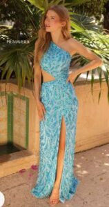 Elegance meets stye with this sequin beaded crystal blue color dress. The asymmetrical neckline, fitted body, side cut out, high side slit, mid open back that laces up and unique slanting sheer back panel make this dress a an exquisite prom dress for your event.