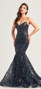 This beautiful midnight color trumpet prom dress features embroidered tulle, glitter tulle and and abundance of sparkling sequins. The plunging sweetheart neckline, corset bodice and lace-up back make a statement any which way you look at this dress.