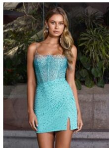 This stunning aqua blue dress features spaghetti straps, a press on bustier that trickles down the wrap skirt. With its illusion neckline and left side slit, this dress is sure to be a hit for your event!
