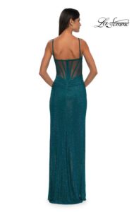 La Femme Prom Dress 32578 Stunning rhinestones embellish this beautiful dark teal jersey dress with a skirt slit. The top features a modified square neckline and exposed boning with back zipper closure.