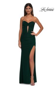This emerald  net jersey dress features a unique top with mesh cut out in the middle, a bodice that features a sweetheart neckline and exposed boning and back zipper closure. 