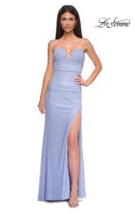 La Femme Prom Dress 32774 This beautiful, light periwinkle, net jersey prom dress features unique square rhinestones throughout the fabric. The strapless top with a V neckline and sheer illusion back creates a sophisticated and elegant look. Back zipper closure.