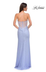 La Femme Prom Dress 32774 This beautiful, light periwinkle, net jersey prom dress features unique square rhinestones throughout the fabric. The strapless top with a V neckline and sheer illusion back creates a sophisticated and elegant look. Back zipper closure.