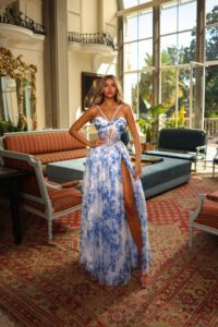 Dress shown in blue/white and is also available in lilac/white and pink/white.