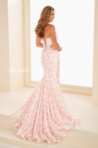 Dress is available in strawberry shortcake color only. This sleek, dreamy stretch knit floral dress features major glam.